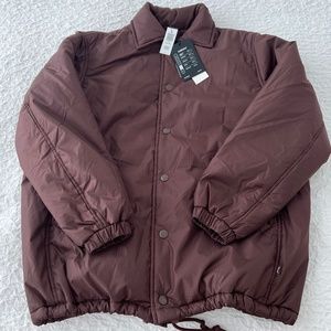 Aritzia TNA coaches puffer
